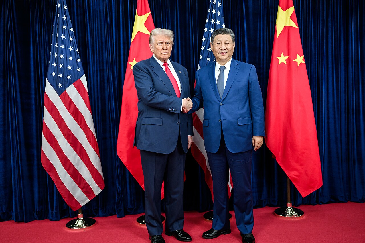 Donald Trump saluda a Xi Jinping